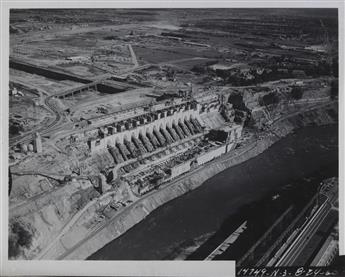 (NIAGARA FALLS--ENERGY) Pair of albums with approximately 178 photographs of the construction of the Robert Moses Niagara Power Plant.